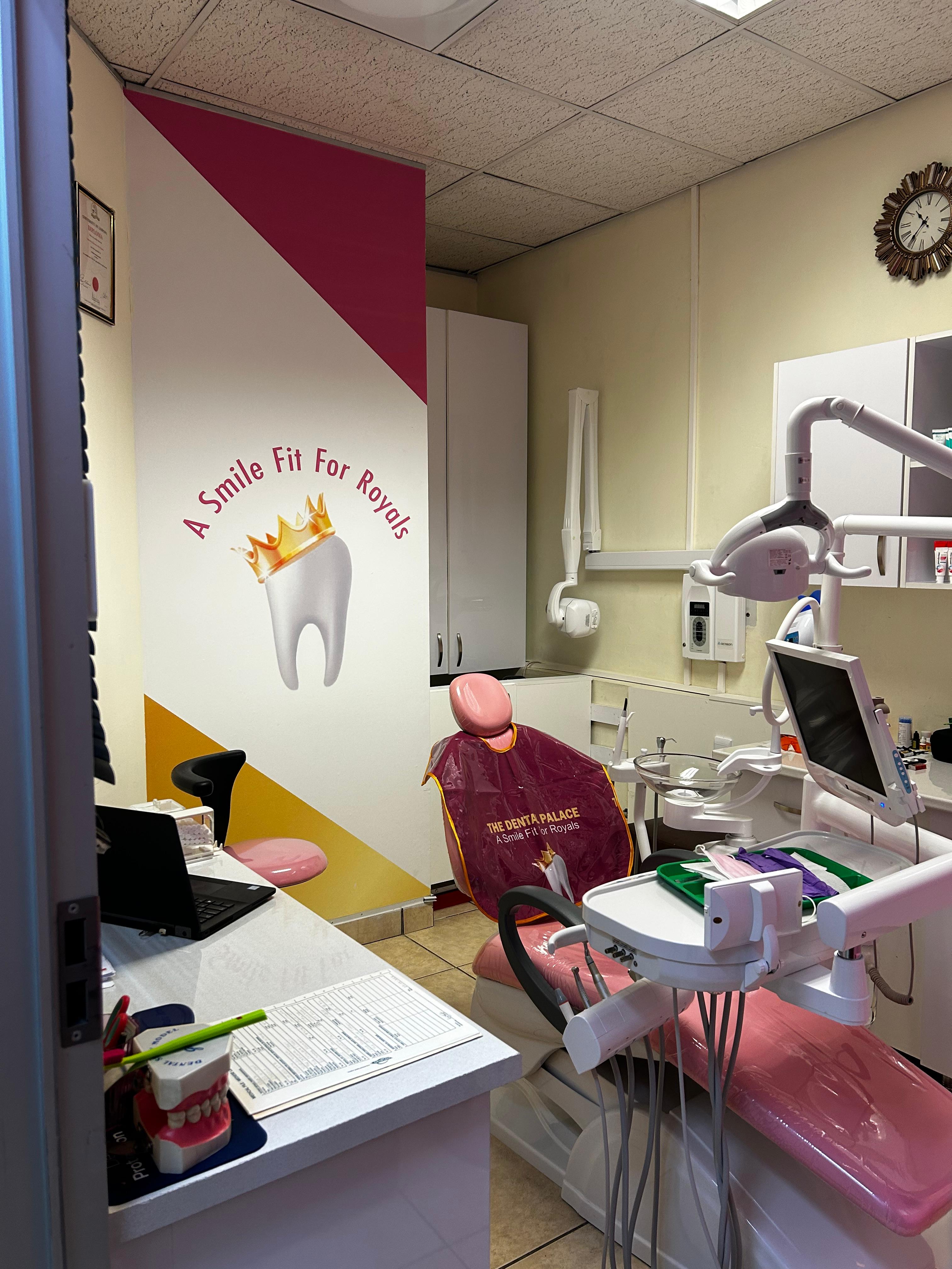 The Dental Palace treatment room with the A Smile Fit For Royals wall